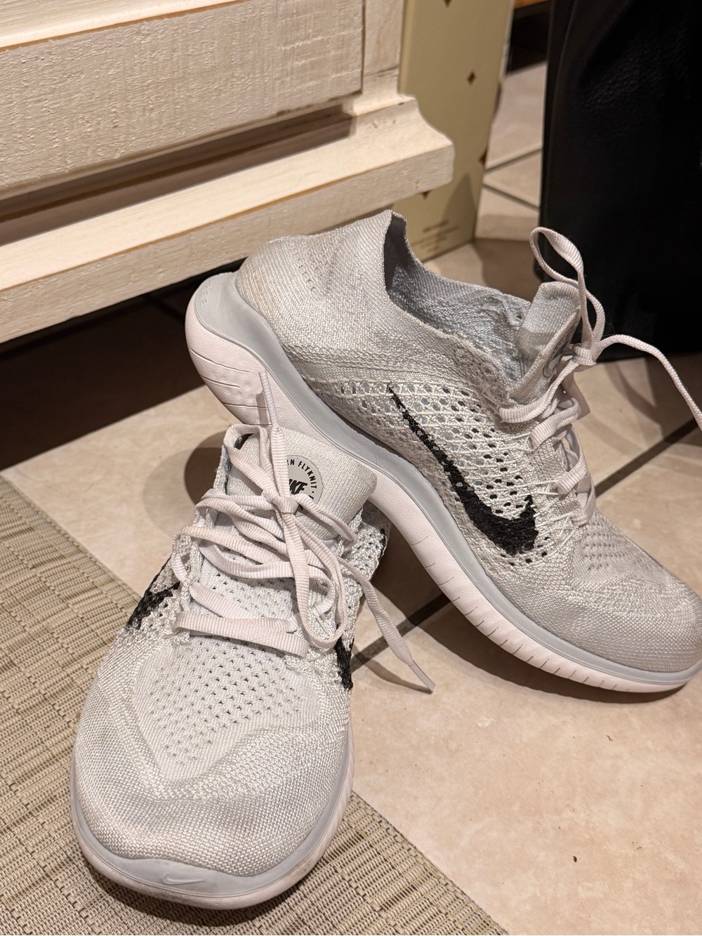 Nike Women’s Flyknit RN 2018 Sneakers - Light Gray with Black Swoosh